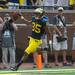 Wide receiver Joe Reynolds celebrities after scoring a touchdown after recovering the ball off of a Central Michigan blocked punt during the fist quarter of their game, Saturday, Aug, 31.
Courtney Sacco I AnnArbor.com 